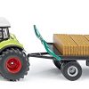 1946 Traktor z chwytakiem bel i przyczepą