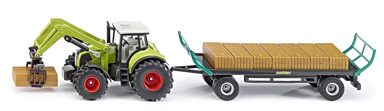 1946 Traktor z chwytakiem bel i przyczepą